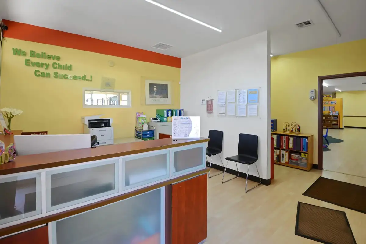 Step into our bright, open lobby — the warm heart of our campus where every family feels at home.
