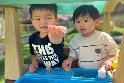 Children doing a theme-based hands-on learning activity at Newport Ave Preschool